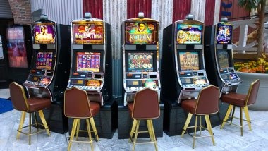 Dragon Tiger Live dealer studio with multiple camera angles showing cards and betting interface